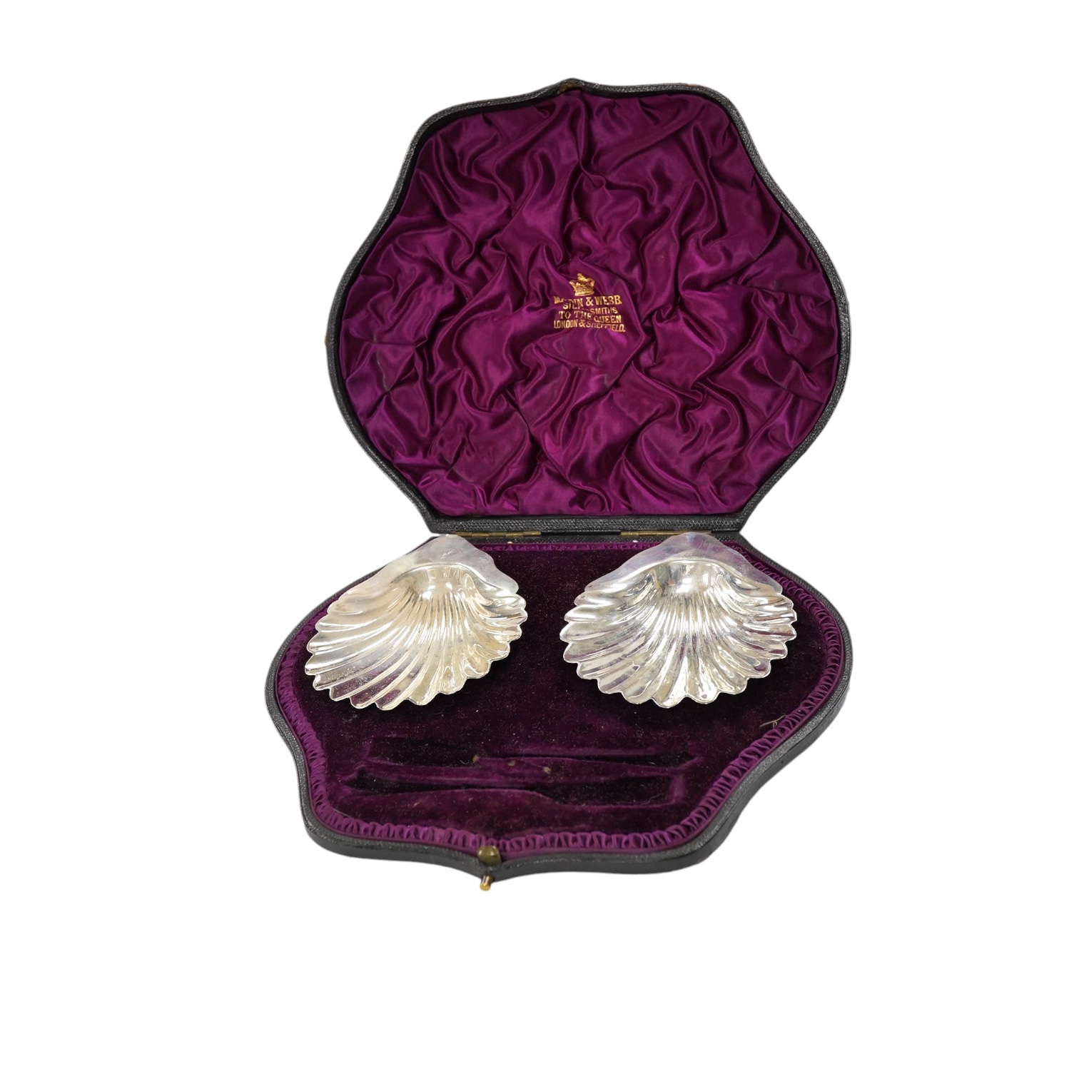 A cased pair of late Victorian silver butter shells, (lacking butter knives), John Newton Mappin, London, 1893. Condition - fair